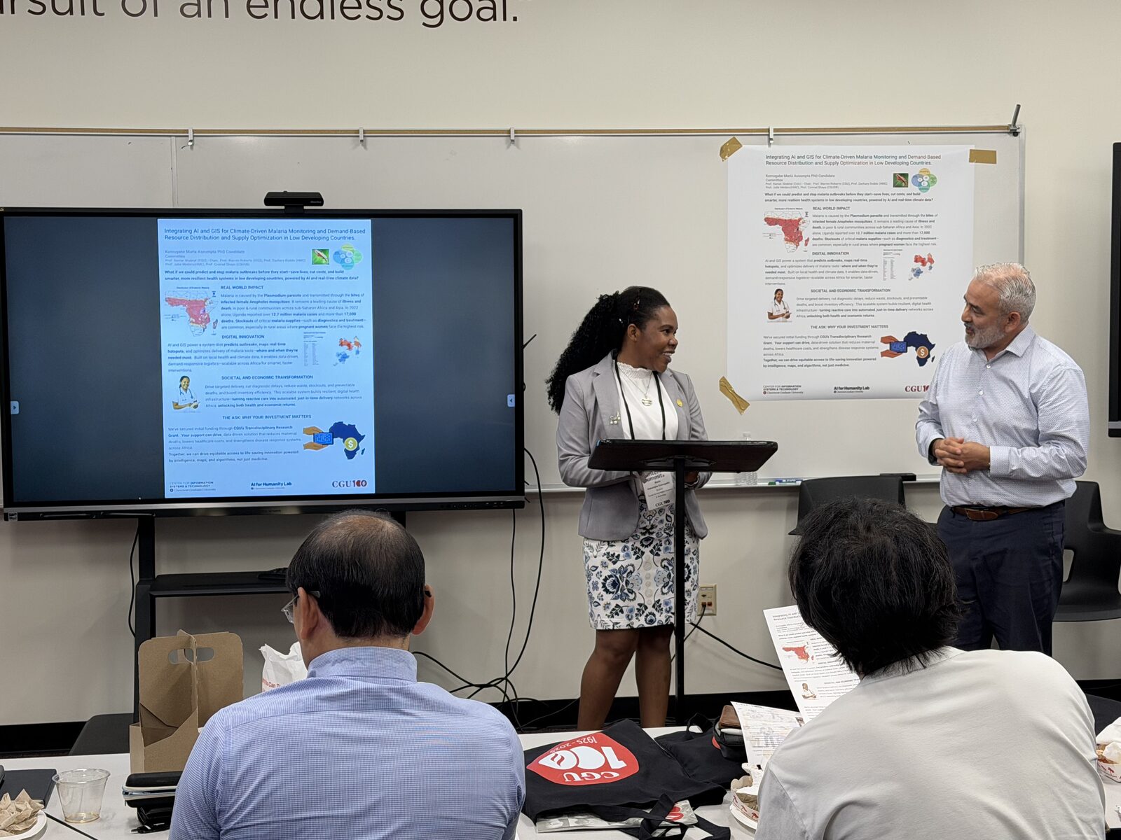 Maria presenting her AI and GIS research to a seminar audience
