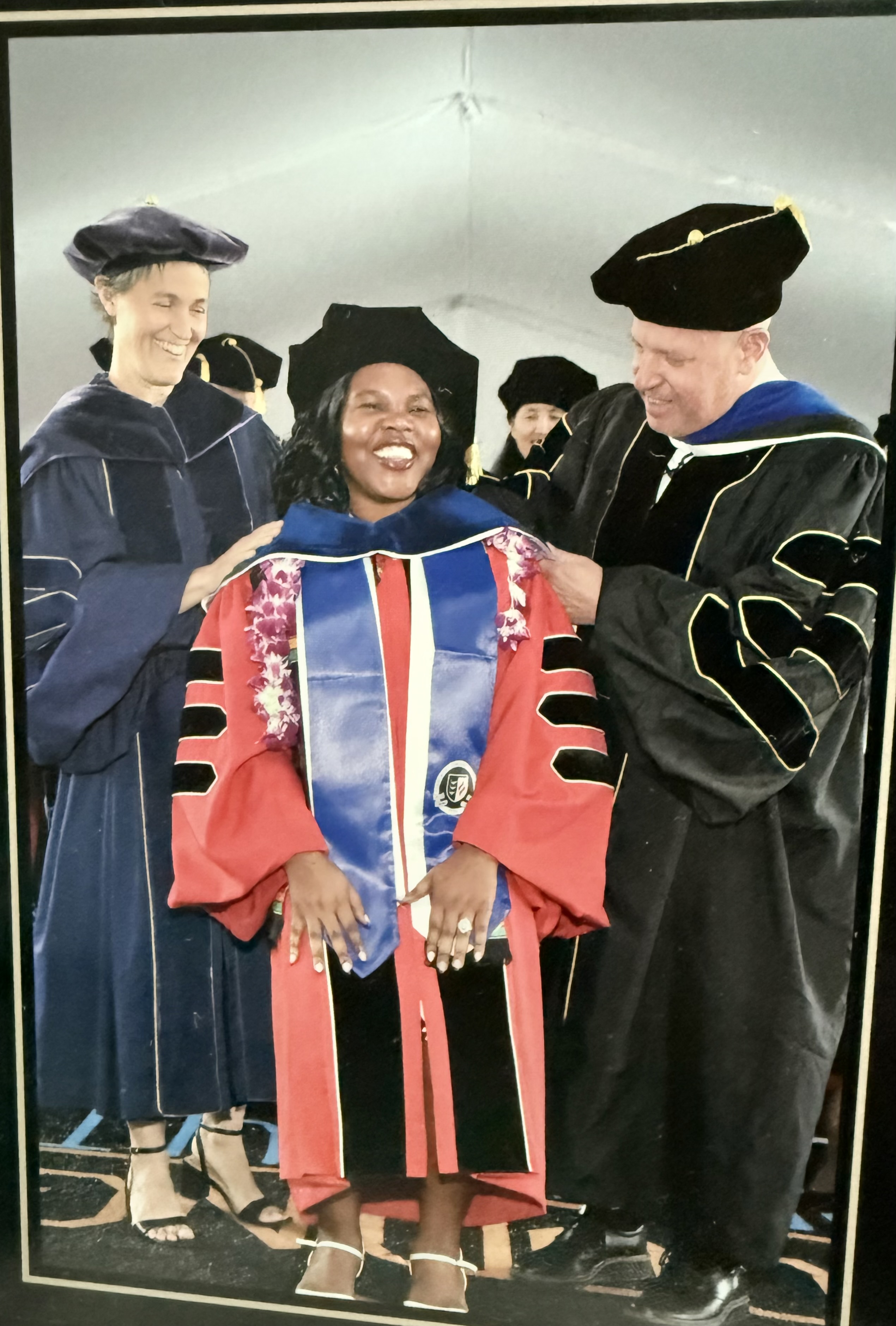 Maria during her Ph.D. hooding at Claremont Graduate University, May 16, 2026.